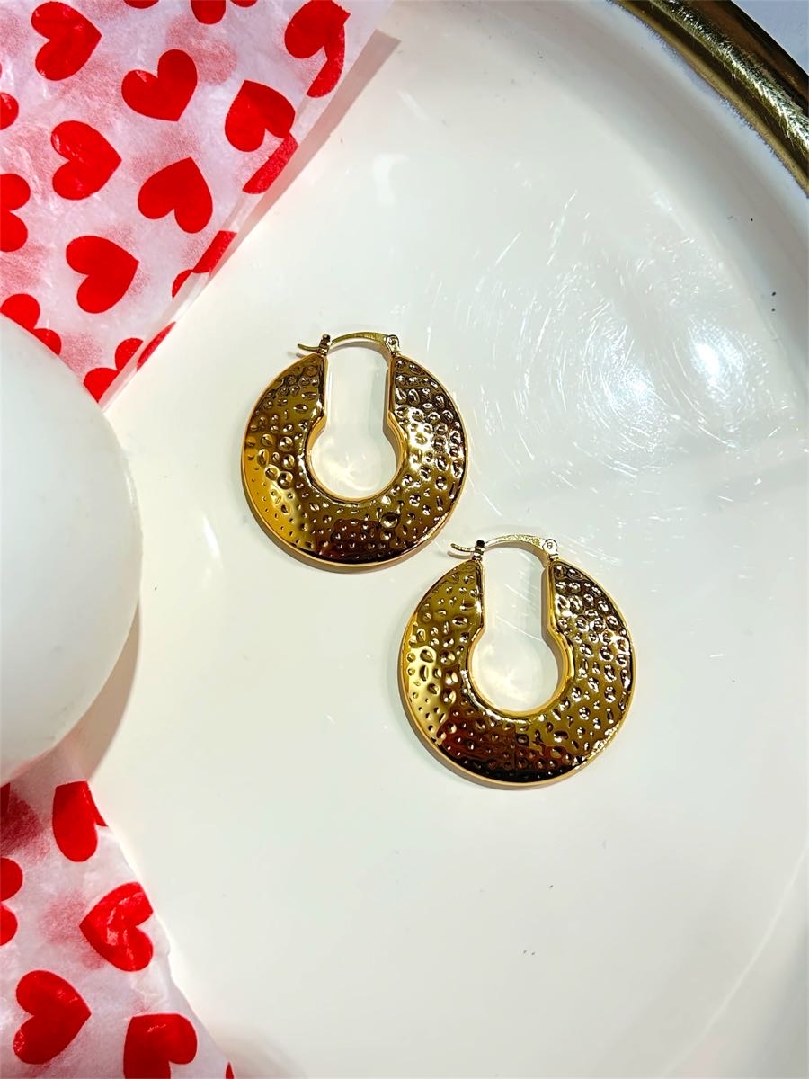 Dimpled earrings